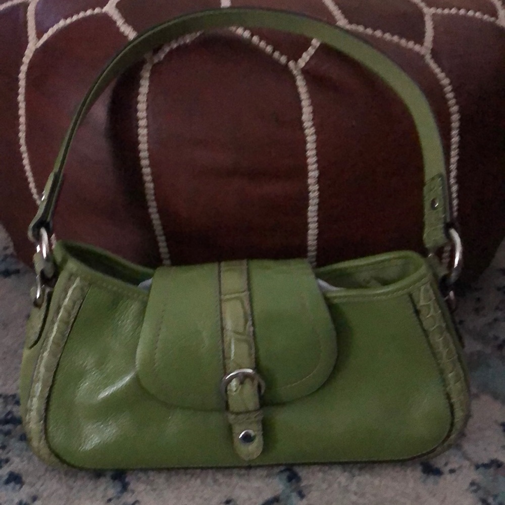 Small purse one front snap inside pockets with card holder.